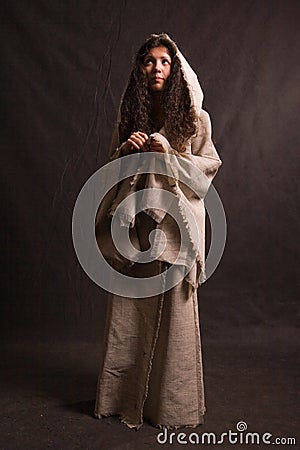 Woman in biblical robe Stock Photo