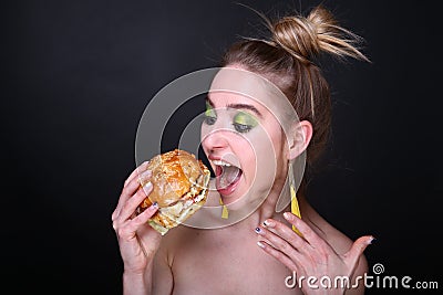 Woman with big hamburger Stock Photo