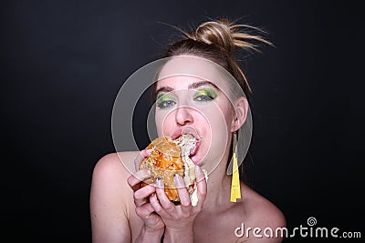 Woman with big hamburger Stock Photo