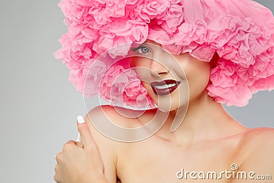 Woman Big Hat and Lips. Model wearing Fabric with lace ruffles hat. High Fashion Model fabric crown or hairstyle Stock Photo