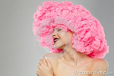 Woman Big Hat and Lips. Model wearing Fabric with lace ruffles hat. High Fashion Model fabric crown or hairstyle Stock Photo