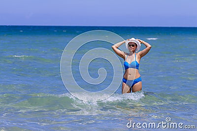 Woman and bikini blue on sea at Ban Krut Beach Stock Photo