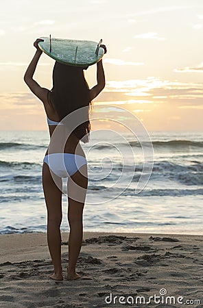 Woman Bikini Surfer & Surfboard Sunset Beach Stock Photo