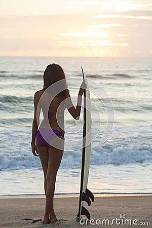 Woman Bikini Surfer & Surfboard Sunset Beach Stock Photo