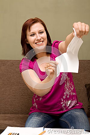 Woman with bills Stock Photo