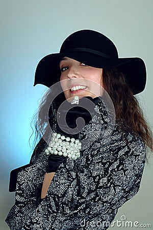 Woman in black hat Stock Photo