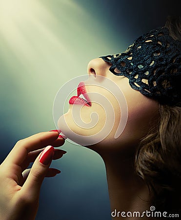 Woman with Black Lace mask Stock Photo