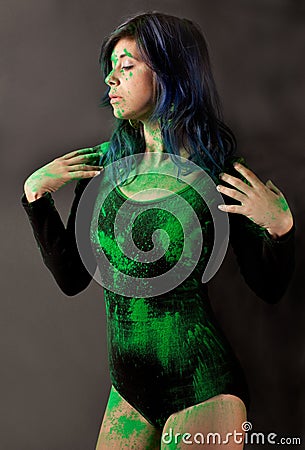 Woman in Black Leotard Covered in Green Poweder Stock Photo