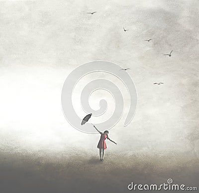 Woman with black umbrella walking free in the outdoors Stock Photo