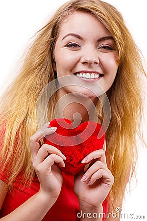 Woman blonde girl holding red heart love symbol Stock Photo