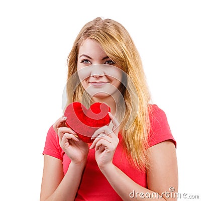 Woman blonde girl holding red heart love symbol Stock Photo