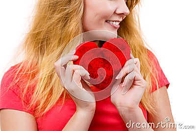 Woman blonde girl holding red heart love symbol Stock Photo