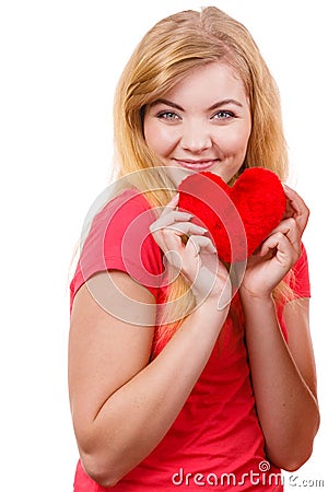 Woman blonde girl holding red heart love symbol Stock Photo