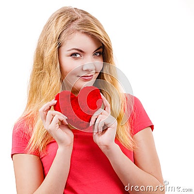 Woman blonde girl holding red heart love symbol Stock Photo