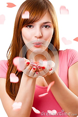 Woman blowing up kiss Stock Photo