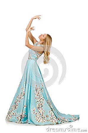 Woman in blue long dress with flower prints Stock Photo