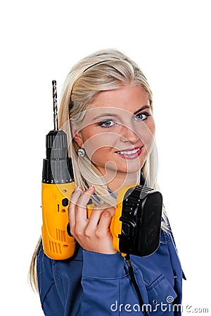 Woman in blue work clothes with drill Stock Photo