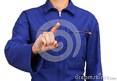 Woman in blue work uniform touching or pointing at something with his finger Stock Photo