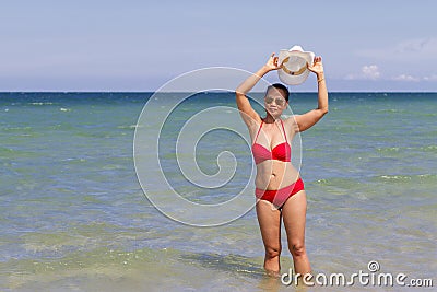 Woman body beautiful with red bikini on beach Stock Photo
