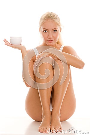 Woman with body lotion Stock Photo