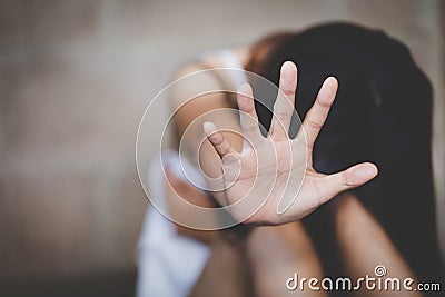 Woman bondage in angle of abandoned building image blur , stop violence against Women, international women`s day Stock Photo