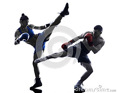 Woman boxer boxing man kickboxing silhouette Stock Photo