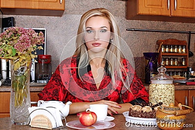 Woman breakfast with apple and cup of hot drink Stock Photo