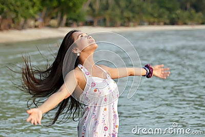 Woman breathing at sea Stock Photo