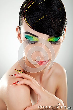 Woman with bright manicure and makeup Stock Photo