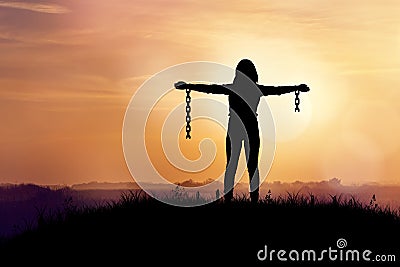 Woman with broken chains. Stock Photo