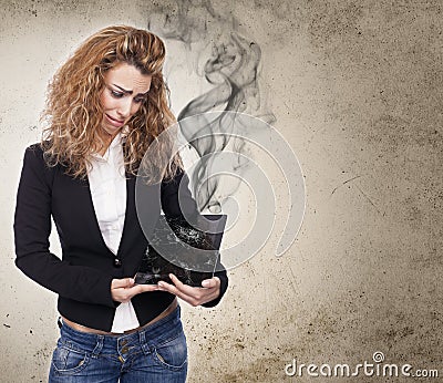 Woman with broken tablet Stock Photo