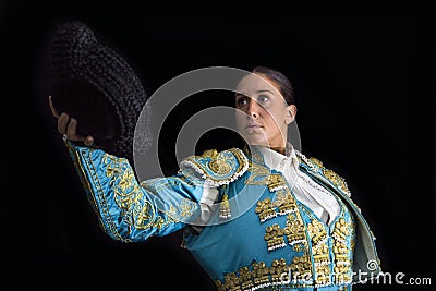 Woman bullfighter salutes with his montera Stock Photo