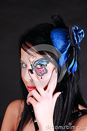 Woman with butterfly makeup Stock Photo