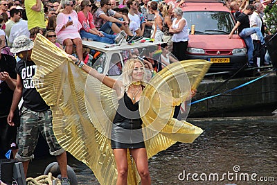 Woman in butterfly outfit, Amsterdam gay pride parade Editorial Stock Photo
