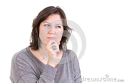 Woman with a calculating pensive look Stock Photo