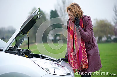 Woman Calling for Car Assistance Stock Photo