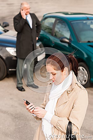 Woman calling insurance after car accident crash Stock Photo