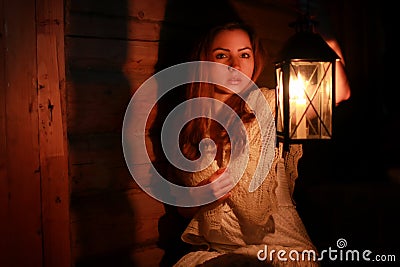 Woman candle lamp dark night Stock Photo