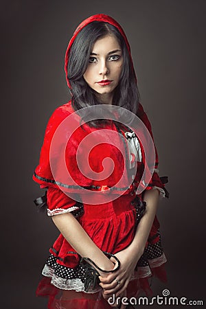 Woman in carnival costume. Little Red Riding Stock Photo