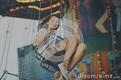 Woman Carnival Ride Riding Happiness Fun Concept Stock Photo