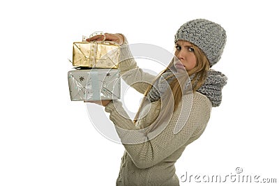 Woman carries heavy christmas presents Stock Photo