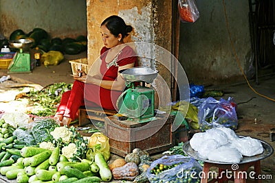 Woman cashing up Stock Photo