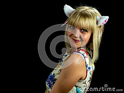 Woman with cat ears. on black background Stock Photo