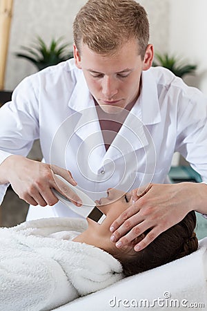 Woman during cavitation peeling Stock Photo