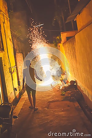 Woman celebrating firework party. Fun with fireworks Editorial Stock Photo