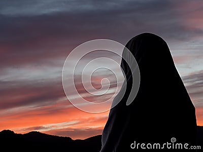 Woman in chador from behind, with copyspace Stock Photo