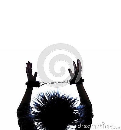 Woman in chains and handcuffs Stock Photo