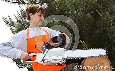 A woman with a chainsaw Stock Photo