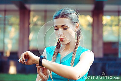 Woman checking amazing good results on smartwatch Stock Photo