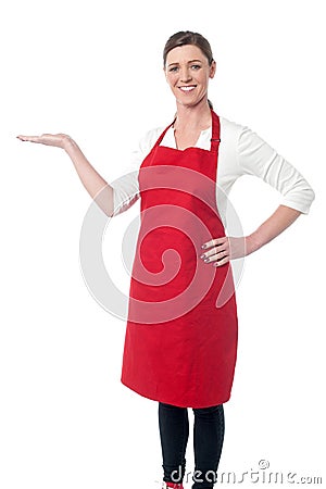 Woman chef inviting at restaurant Stock Photo